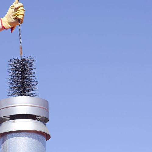 a chimney being cleaned